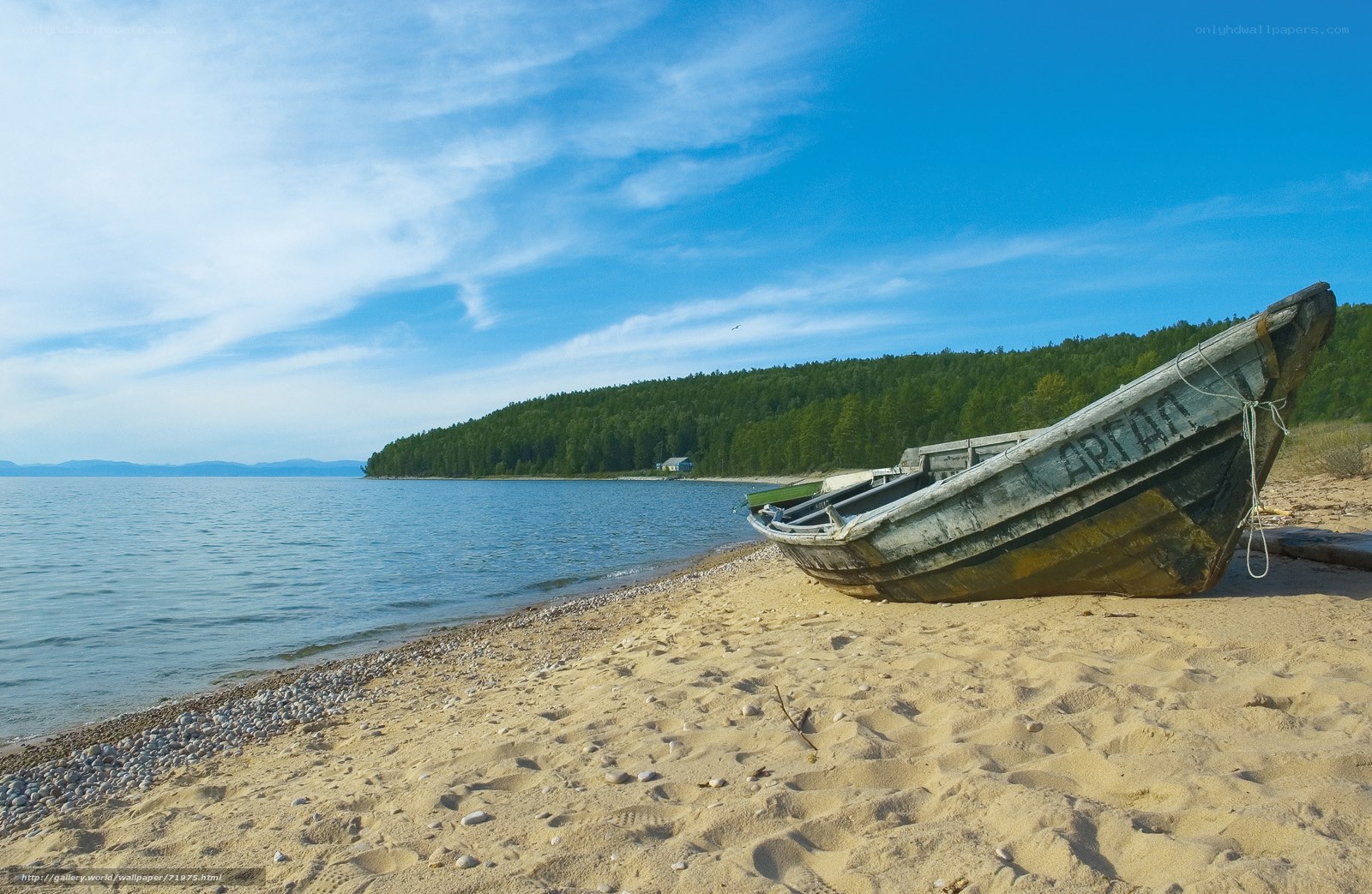 Abandoned boat on a lakeshore