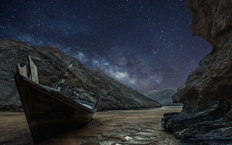 Abandoned Boat on Beach — Dark Blue