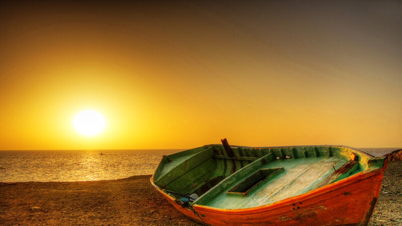 Abandoned Boat on Beach — Orange, Serene, Sunset