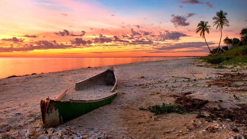 Abandoned Boat on Beach — Orange, Serene