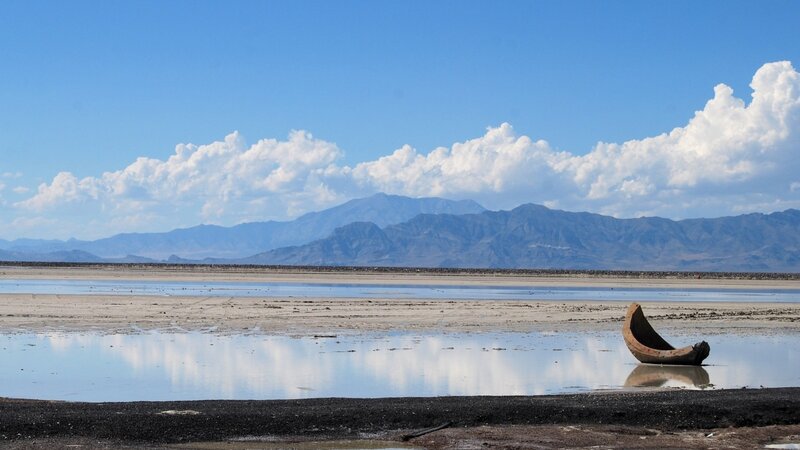 Abandoned boat on dry lakebed