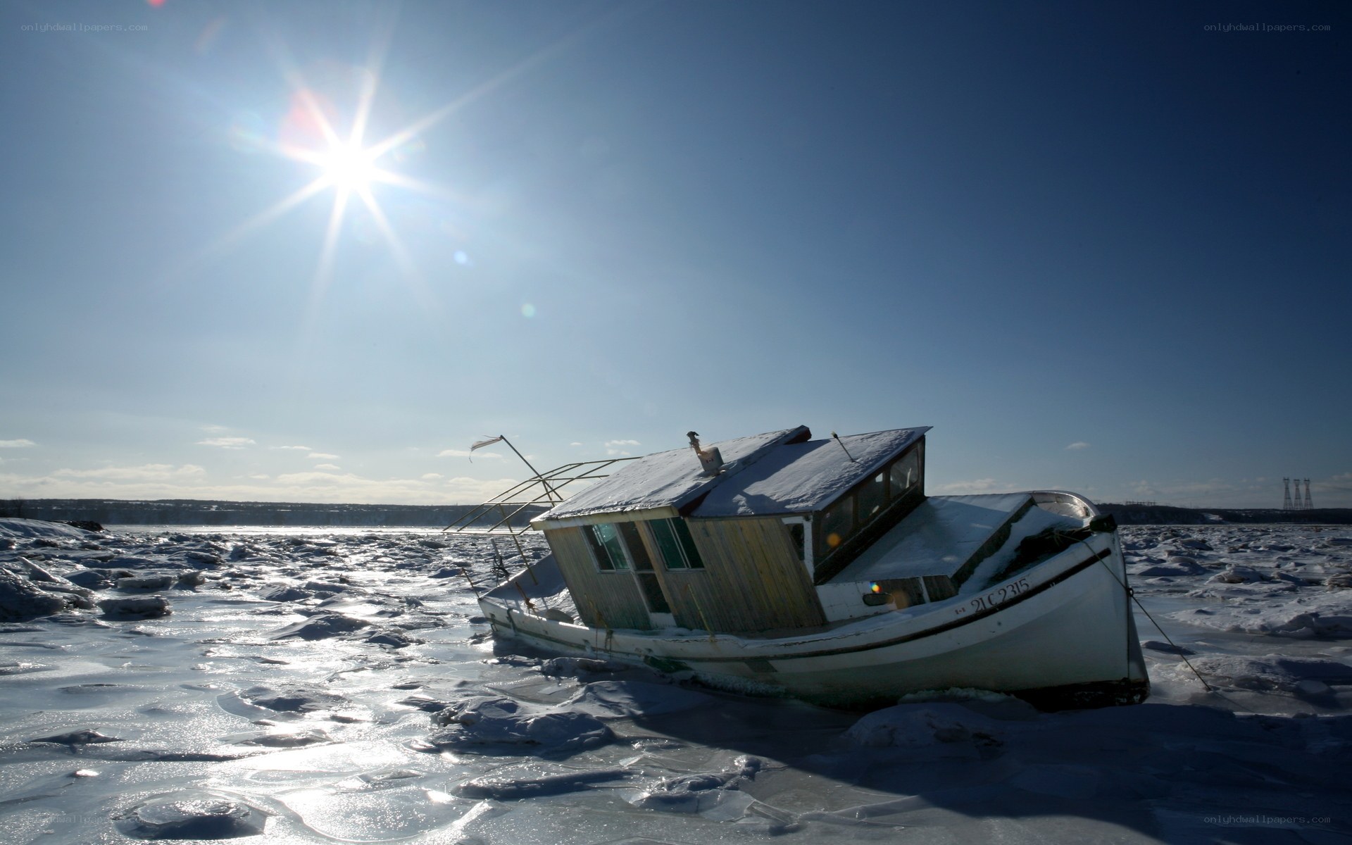 Abandoned boat on ice