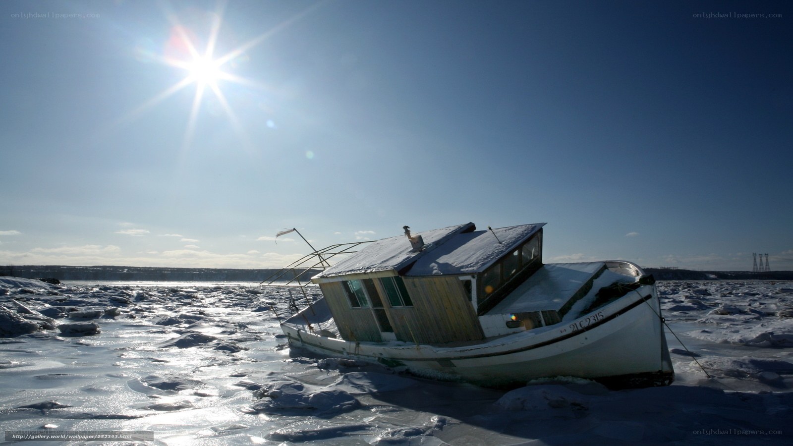 Abandoned boat on ice