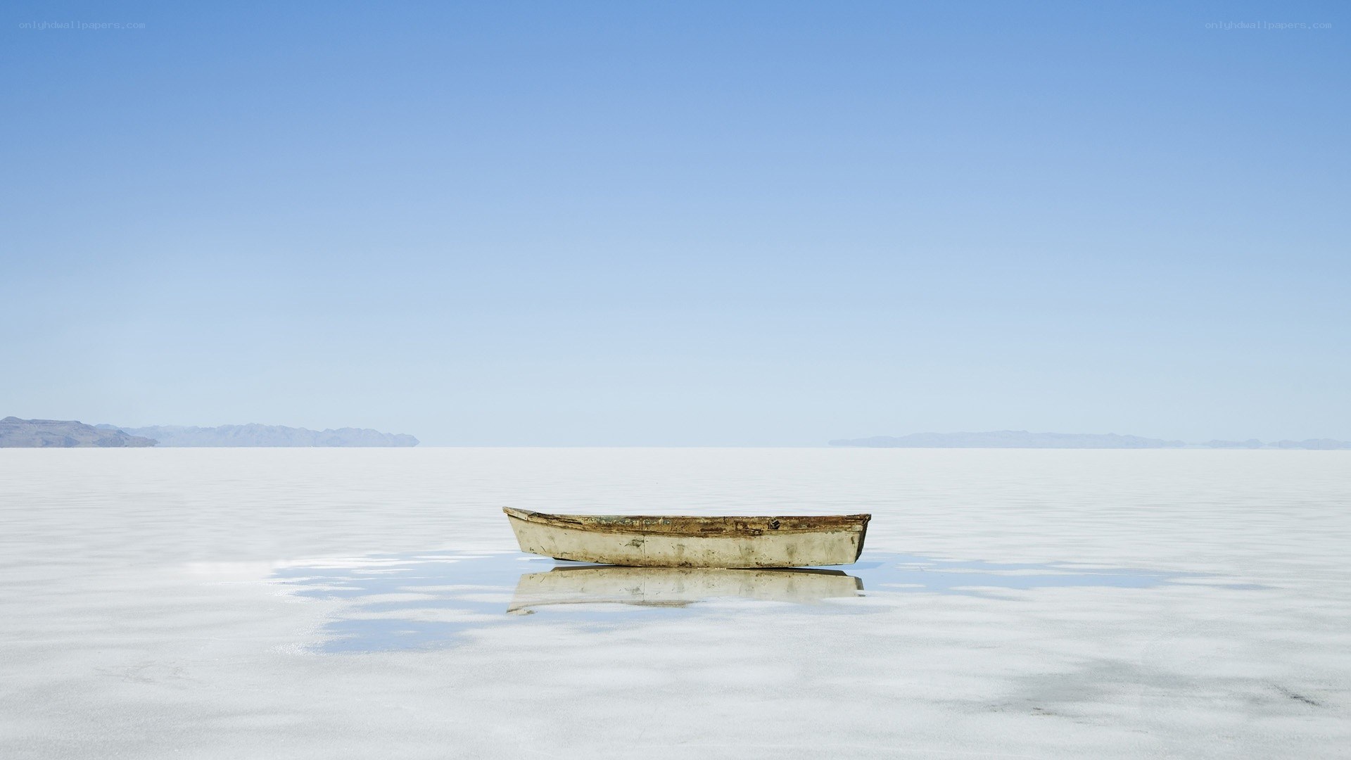 Abandoned boat on salt flat