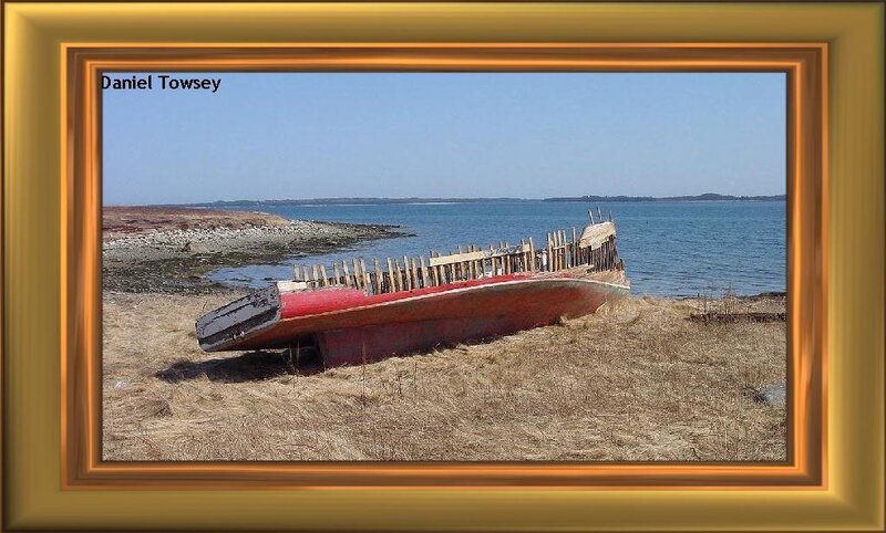 Abandoned boat on shore