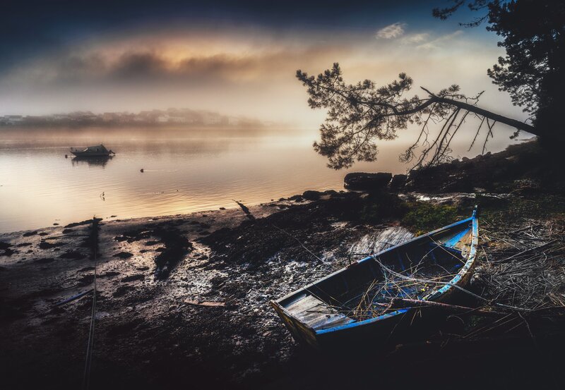 Abandoned Boat on Shore — Blue, Dramatic, Morning
