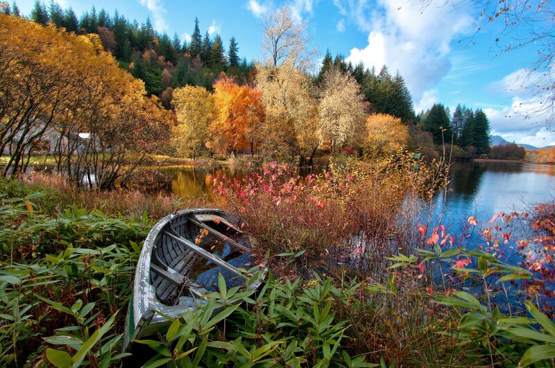 Abandoned Boat on Shore — Blue, Serene, Autumn, Photograph, Lake
