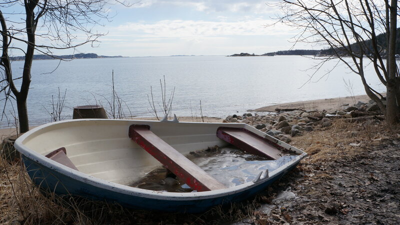 Abandoned Boat on Shore — Blue, Serene, Winter