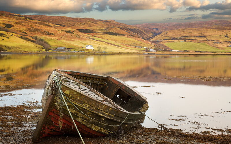 Abandoned Boat on Shore — Brown, Serene, Sunset