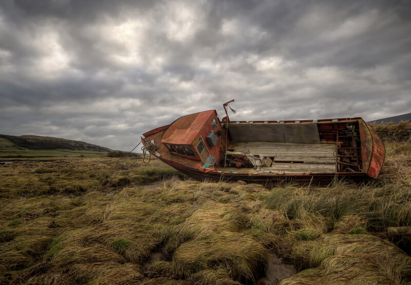 Abandoned Boat on Shore — Gray, Dramatic