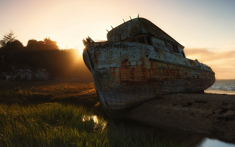Abandoned Boat on Shore — Orange, Dramatic
