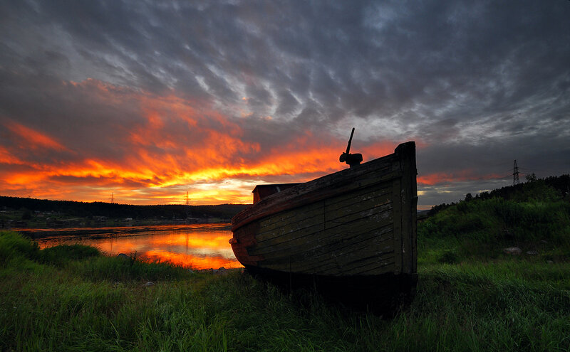 Abandoned Boat on Shore — Orange