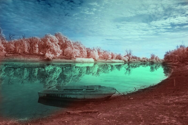 Abandoned Boat on Shore — Teal