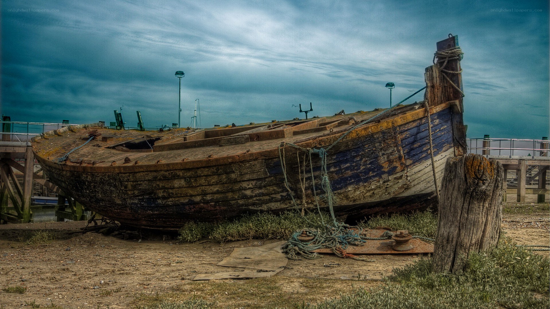 abandoned boat on shore