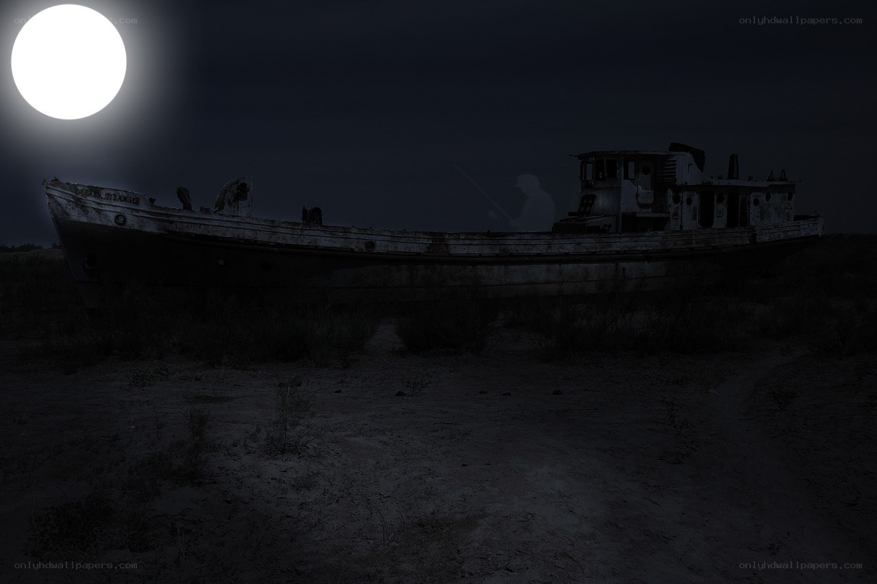 Abandoned boat under moonlight