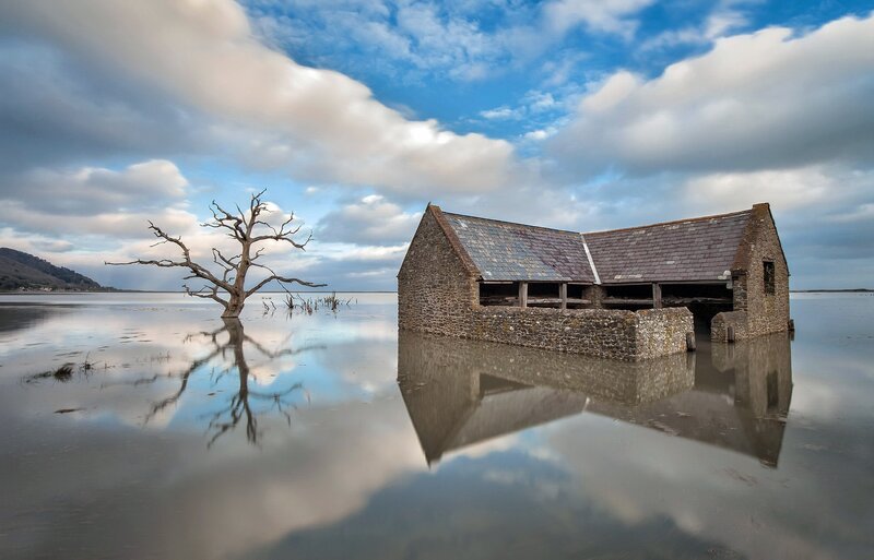 Abandoned Boathouse in Water