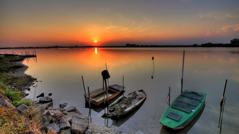 Abandoned Boats at Sunset — Orange