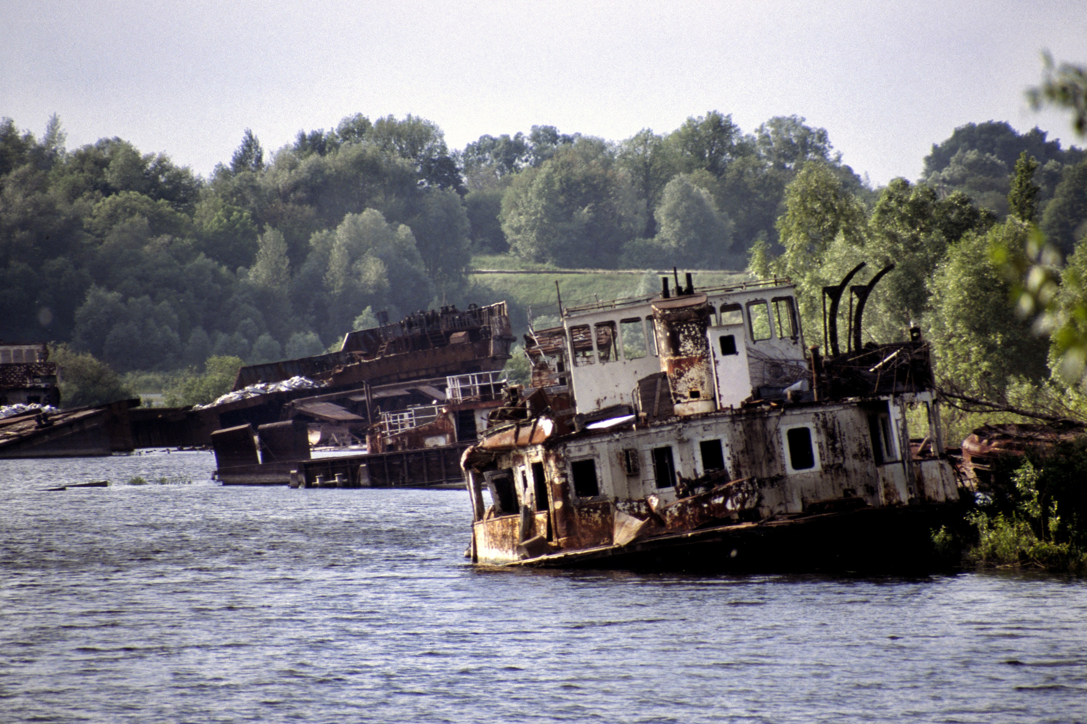 Abandoned boats in a river