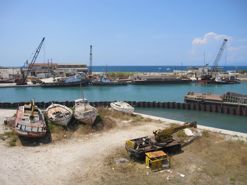 Abandoned Boats in Harbor — Blue, Dull
