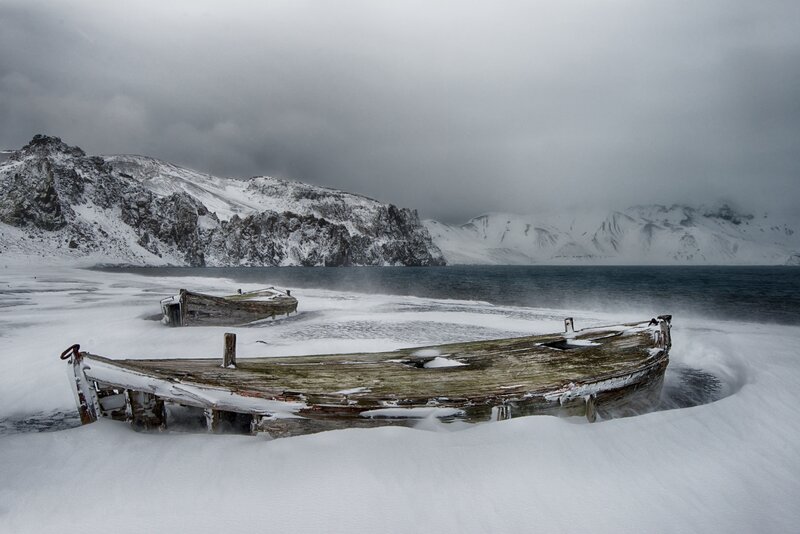 Abandoned Boats in Snow — White