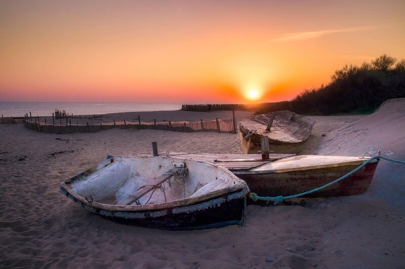 Abandoned Boats on Beach — Orange, Serene