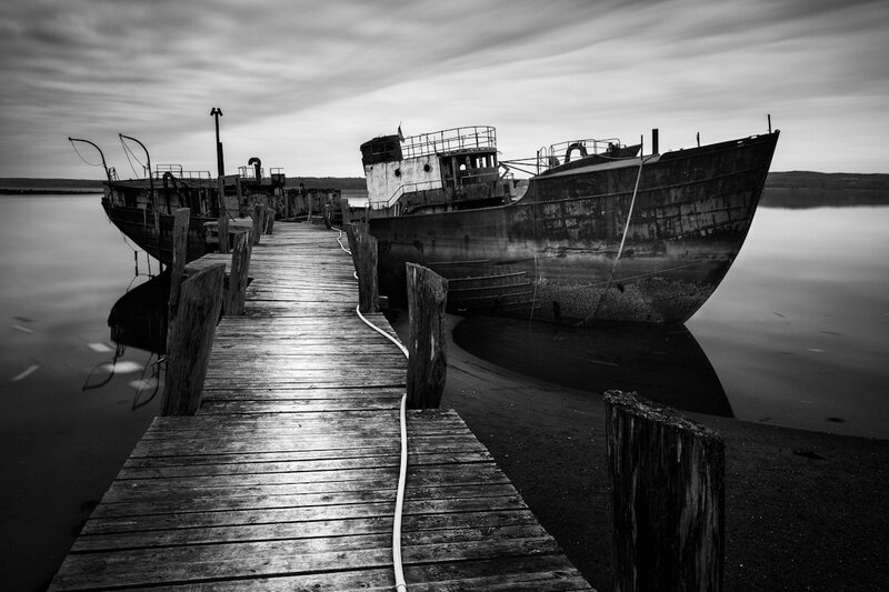 Abandoned Boats on Dock