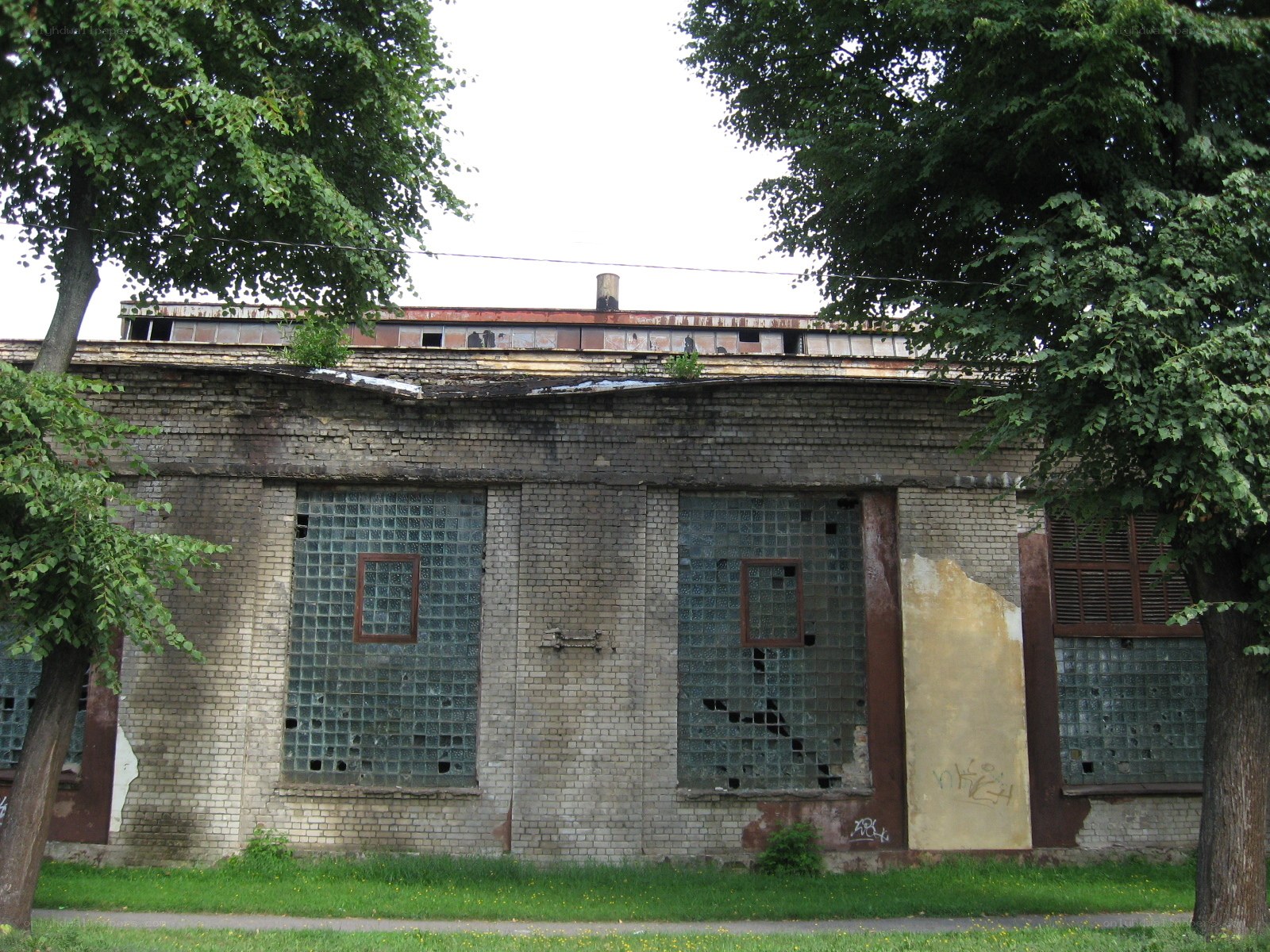 abandoned brick building with glass block windows