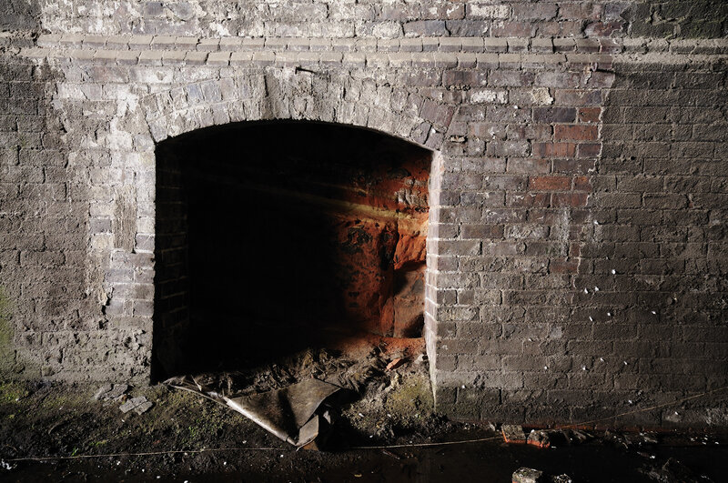 abandoned brick fireplace