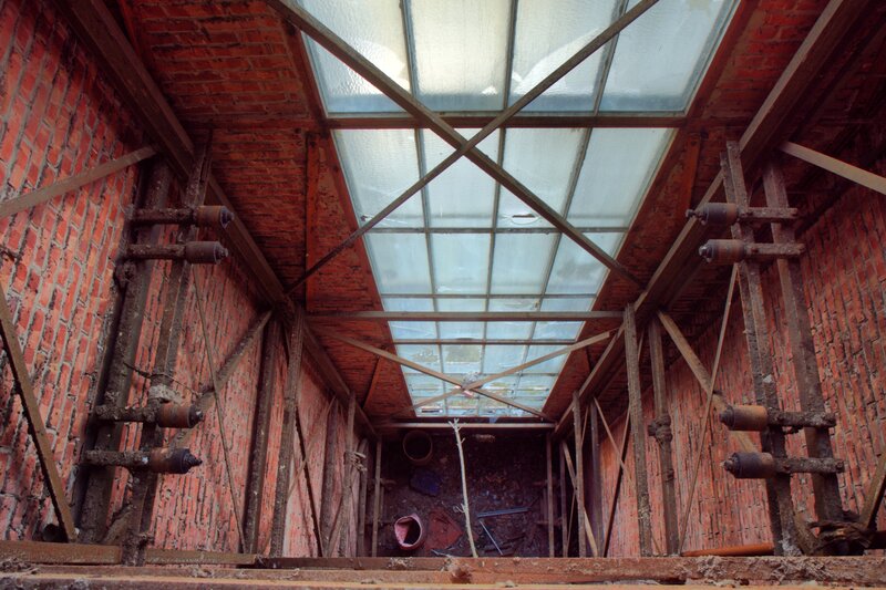 Abandoned brick shaft with skylight