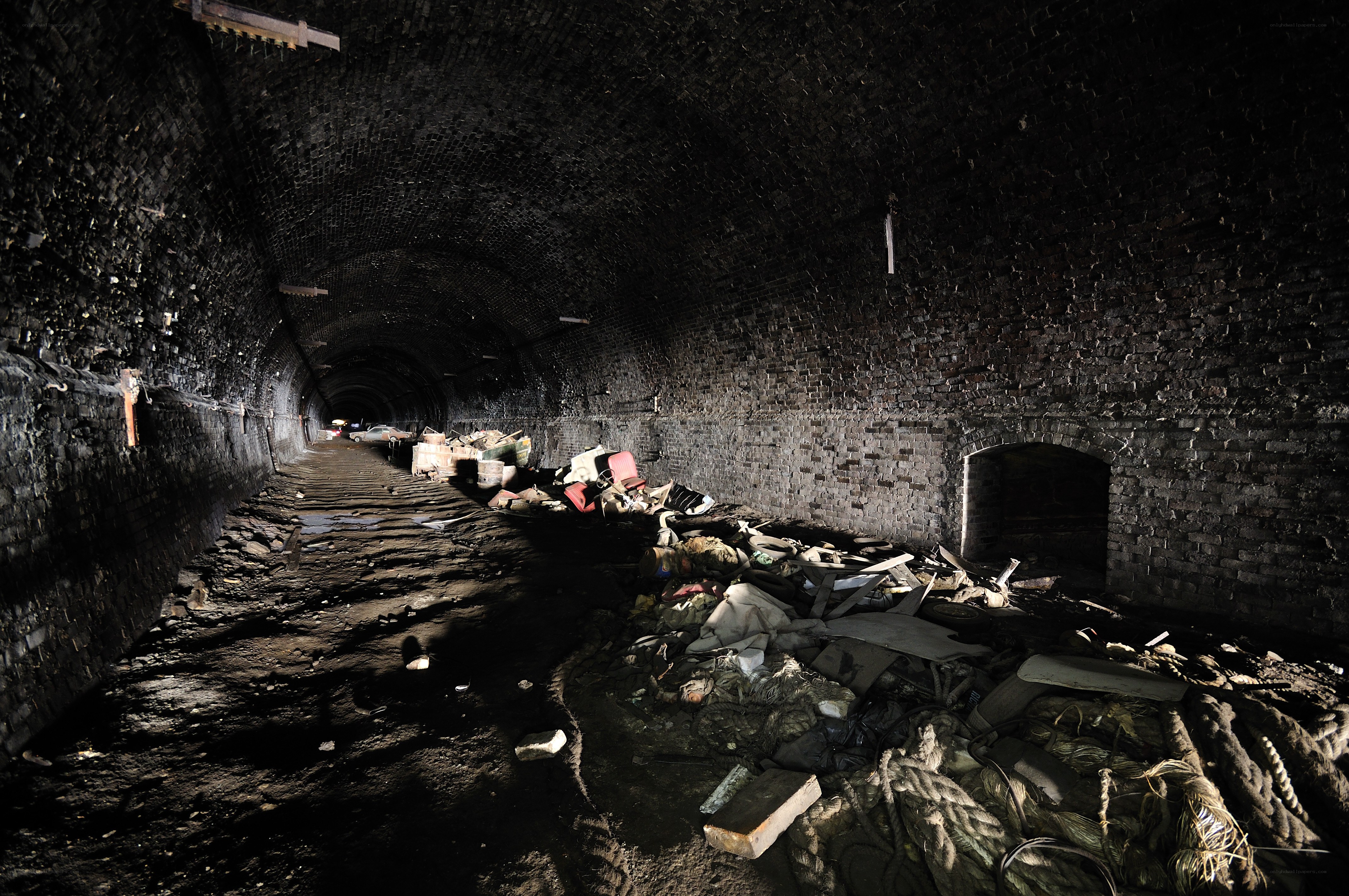 Abandoned brick tunnel interior