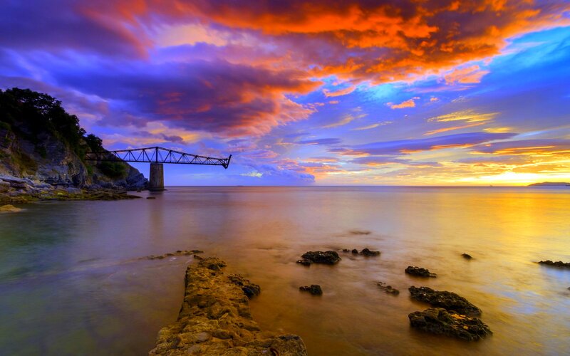 Abandoned Bridge at Sunset — Orange