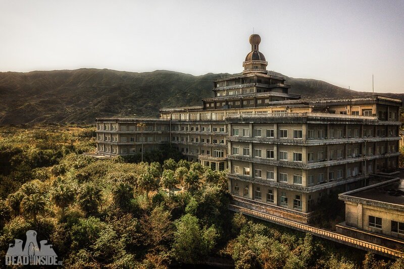 Abandoned Building Complex — Green, Desolate
