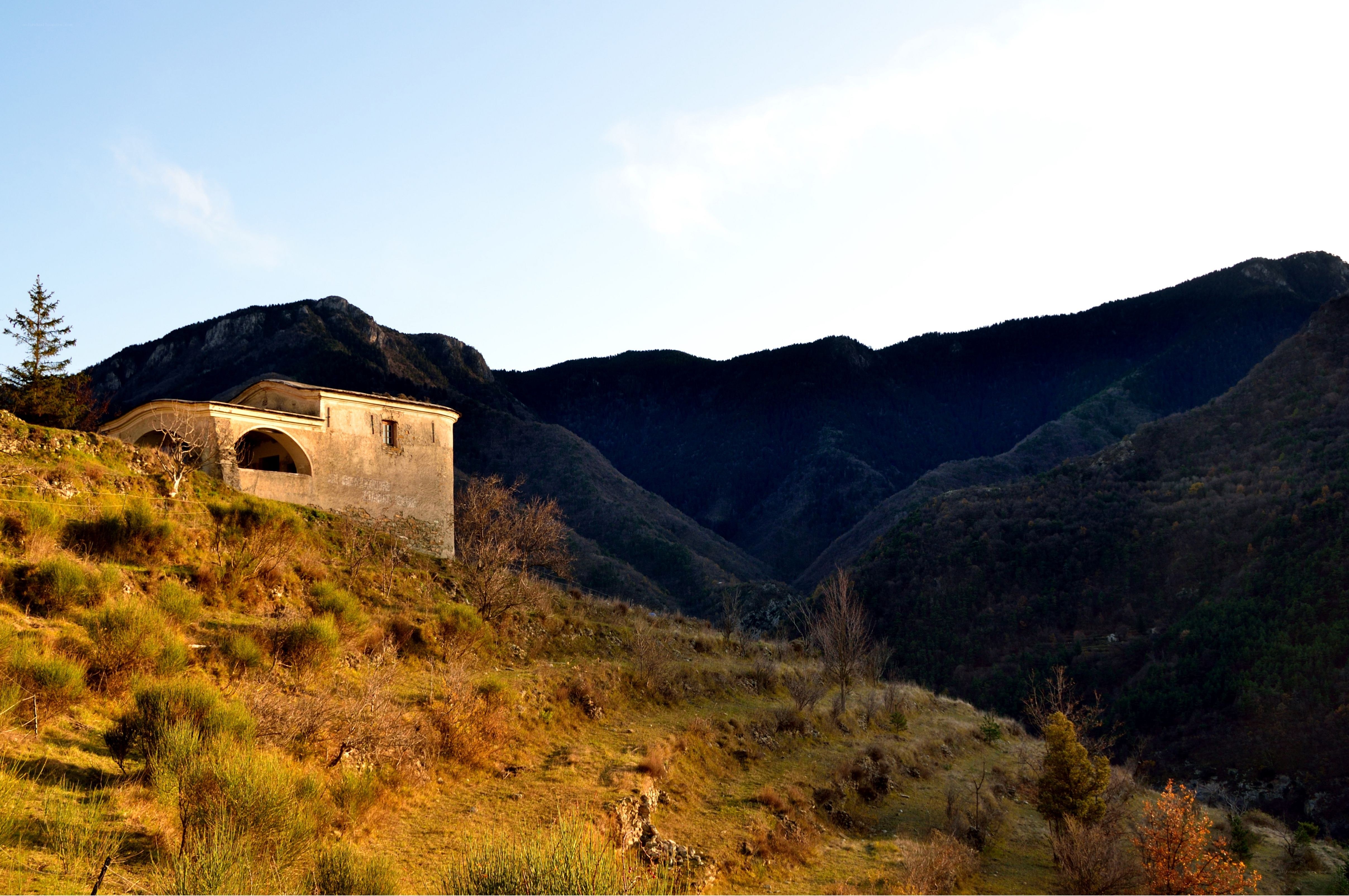 Abandoned building in mountain valley