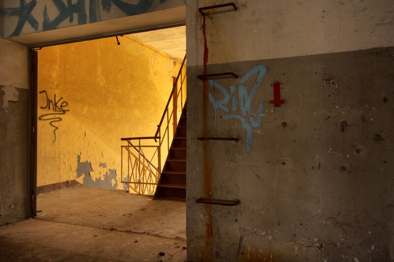 Abandoned building interior with graffiti