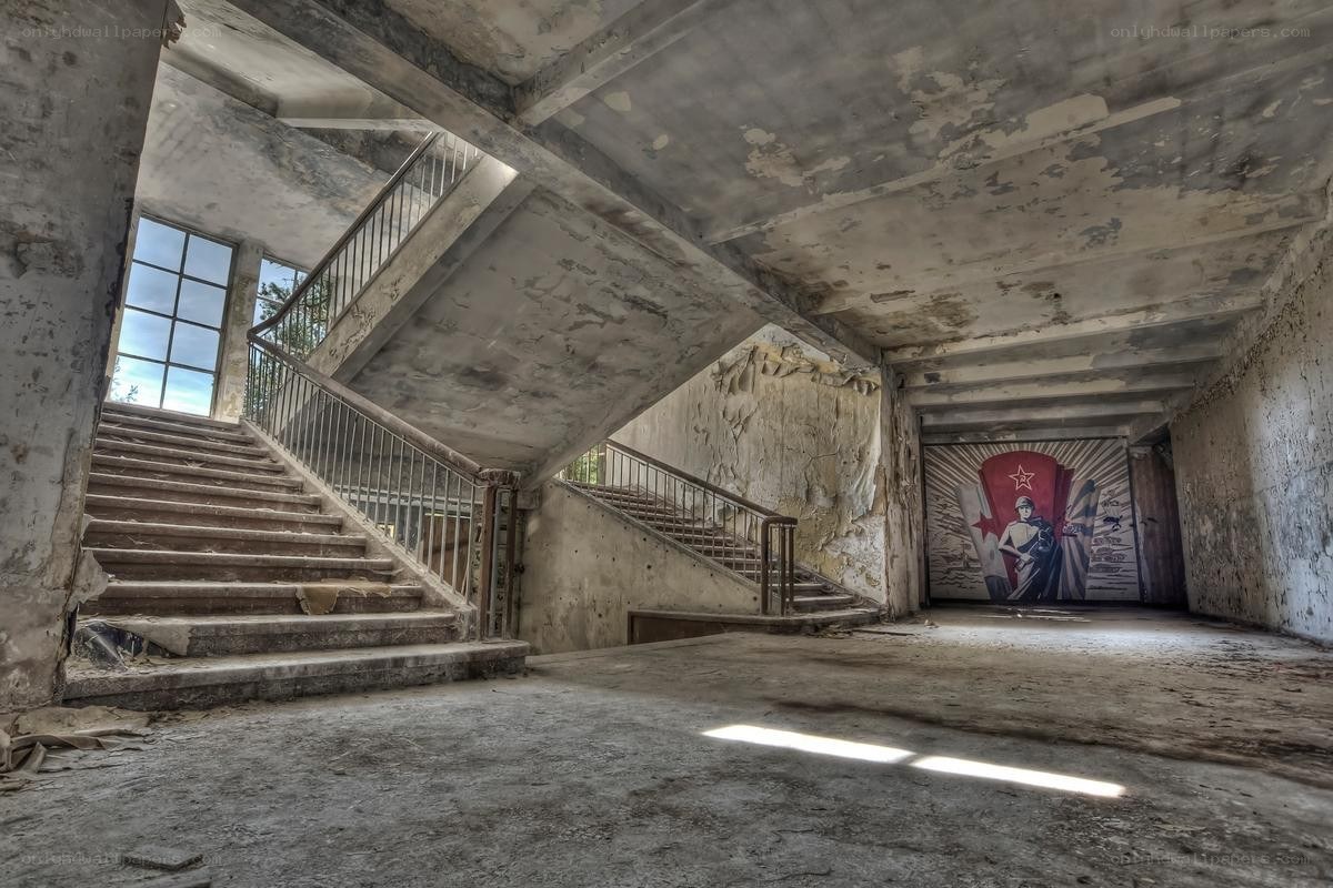Abandoned building interior with mural