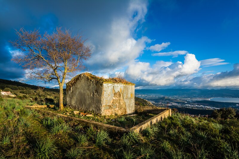 Abandoned Building on Hill — Blue, Dramatic