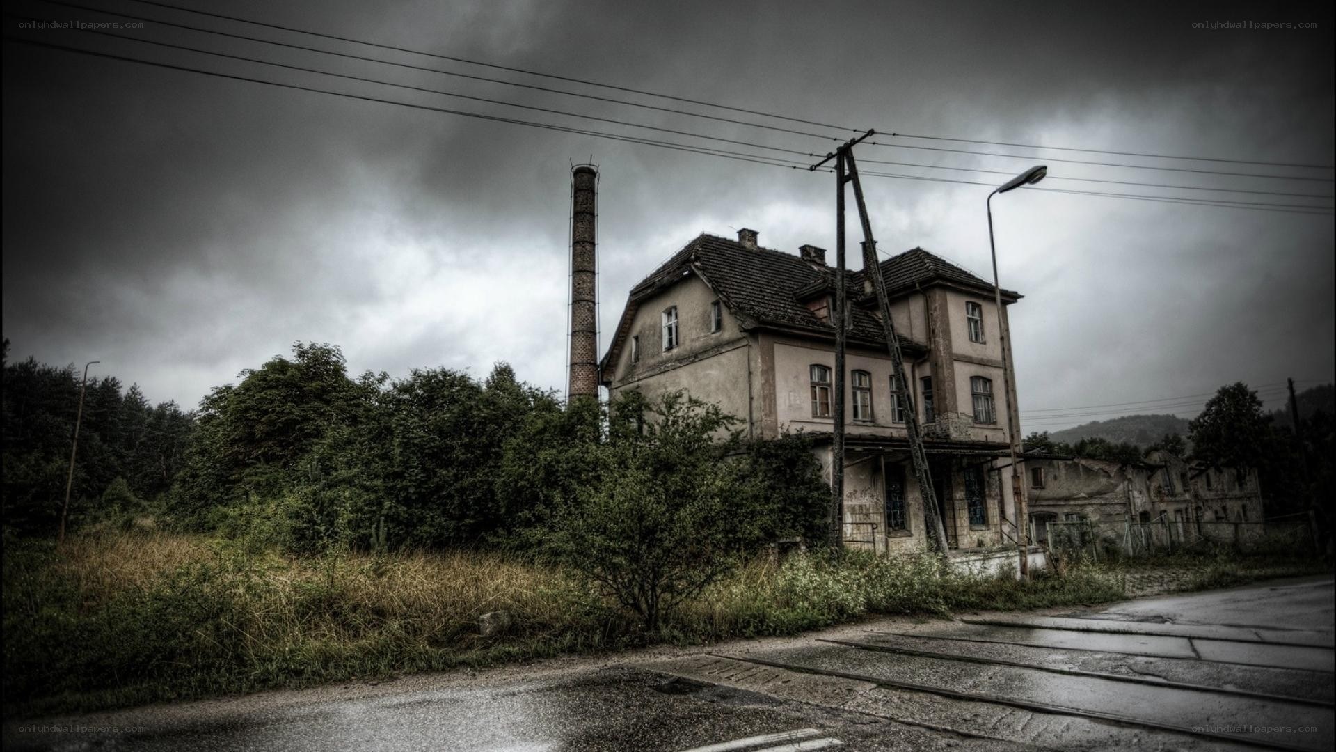 abandoned building under stormy sky