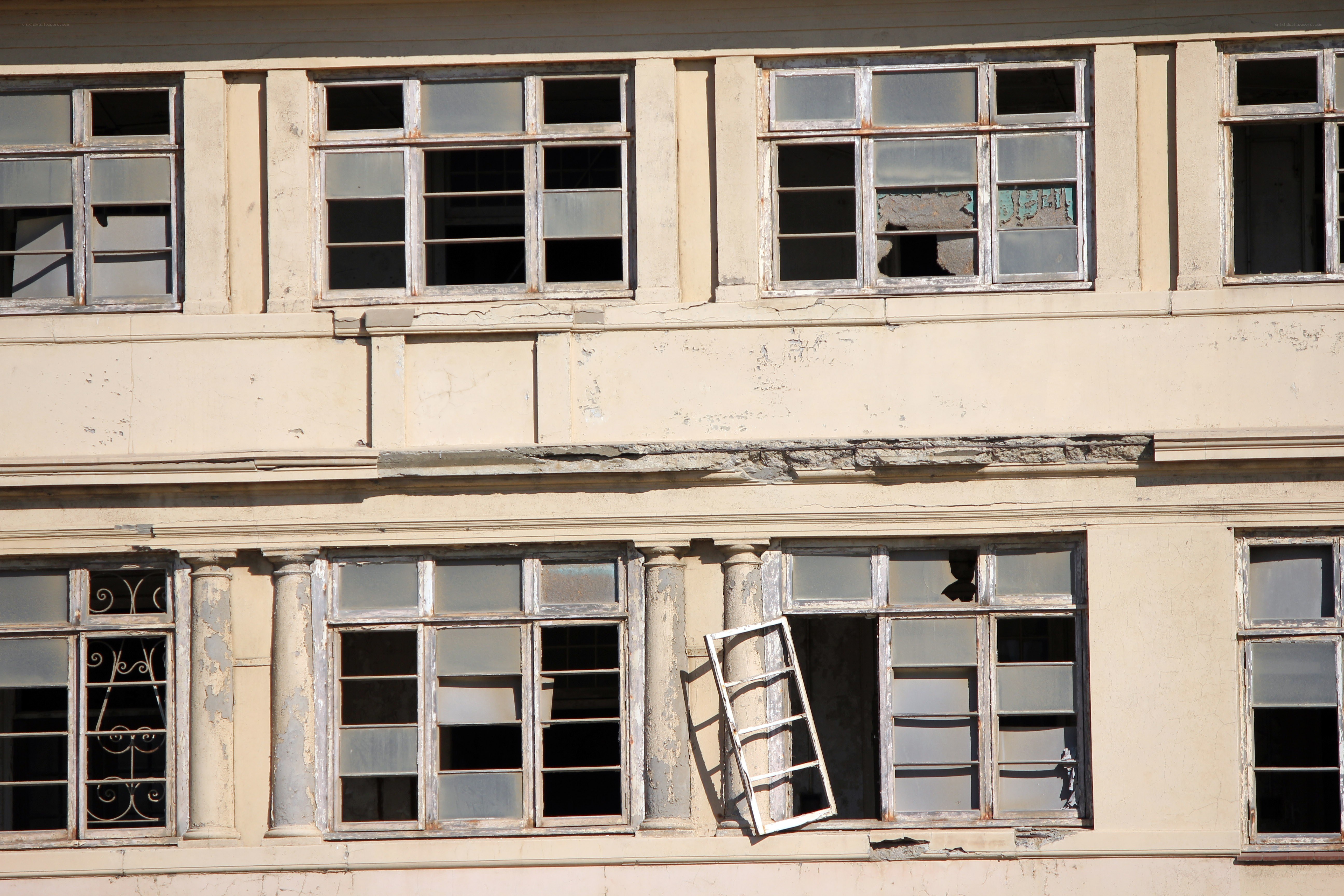 abandoned building with broken windows