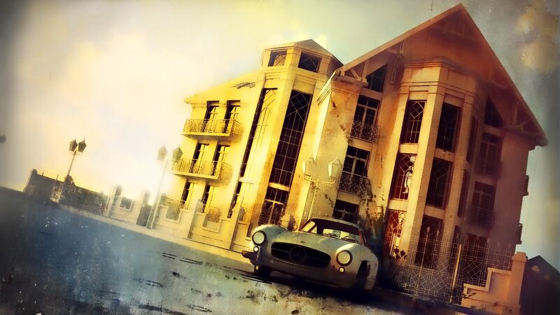 abandoned building with classic car
