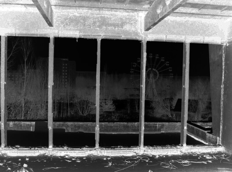 Abandoned building with Ferris wheel