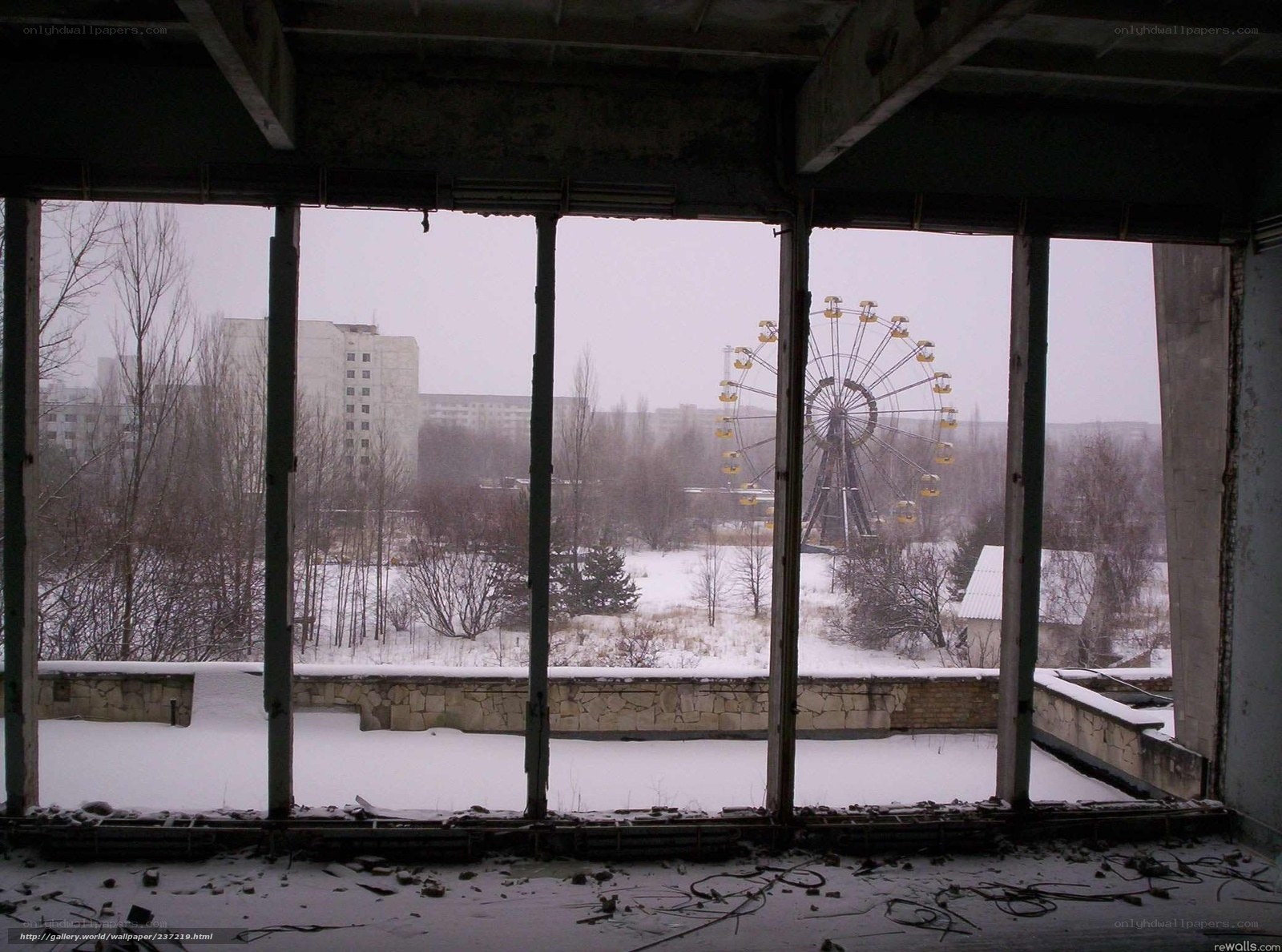 Abandoned building with ferris wheel