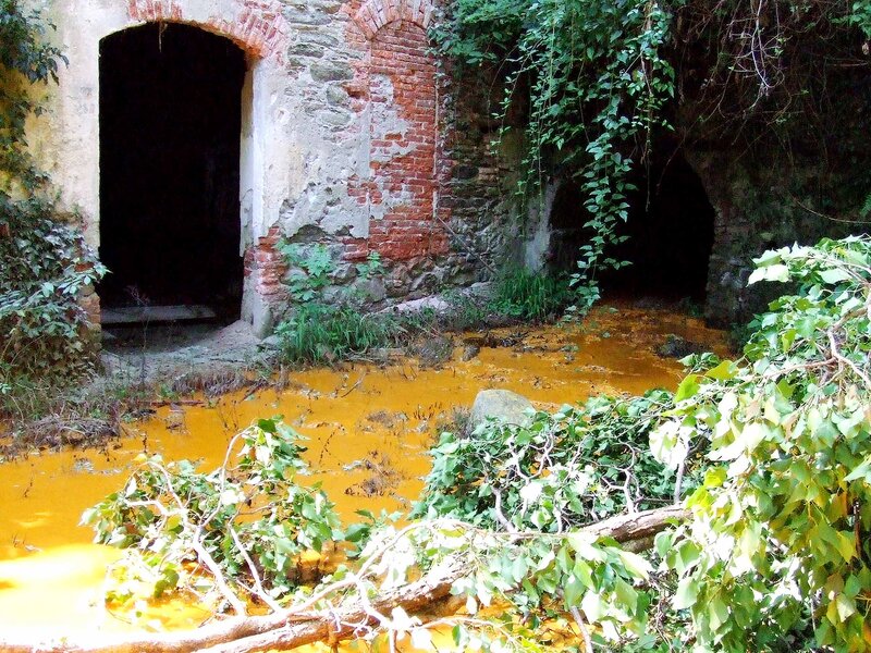 Abandoned Building with Polluted Water