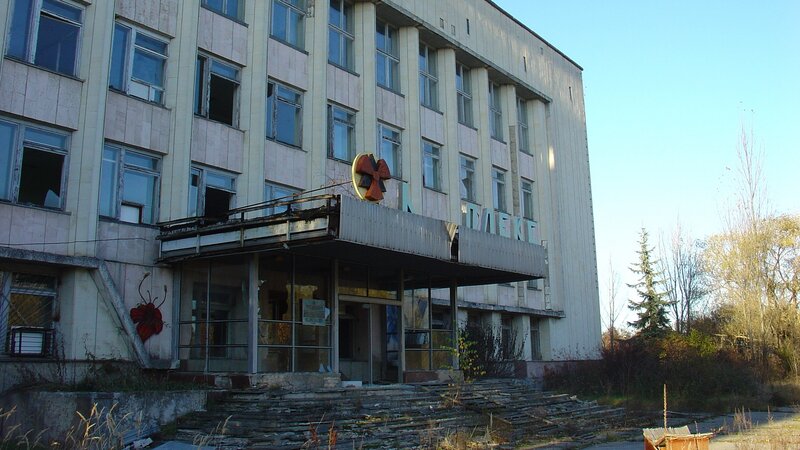 Abandoned building with radiation symbol