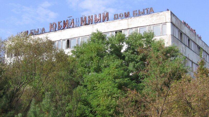 abandoned building with sign