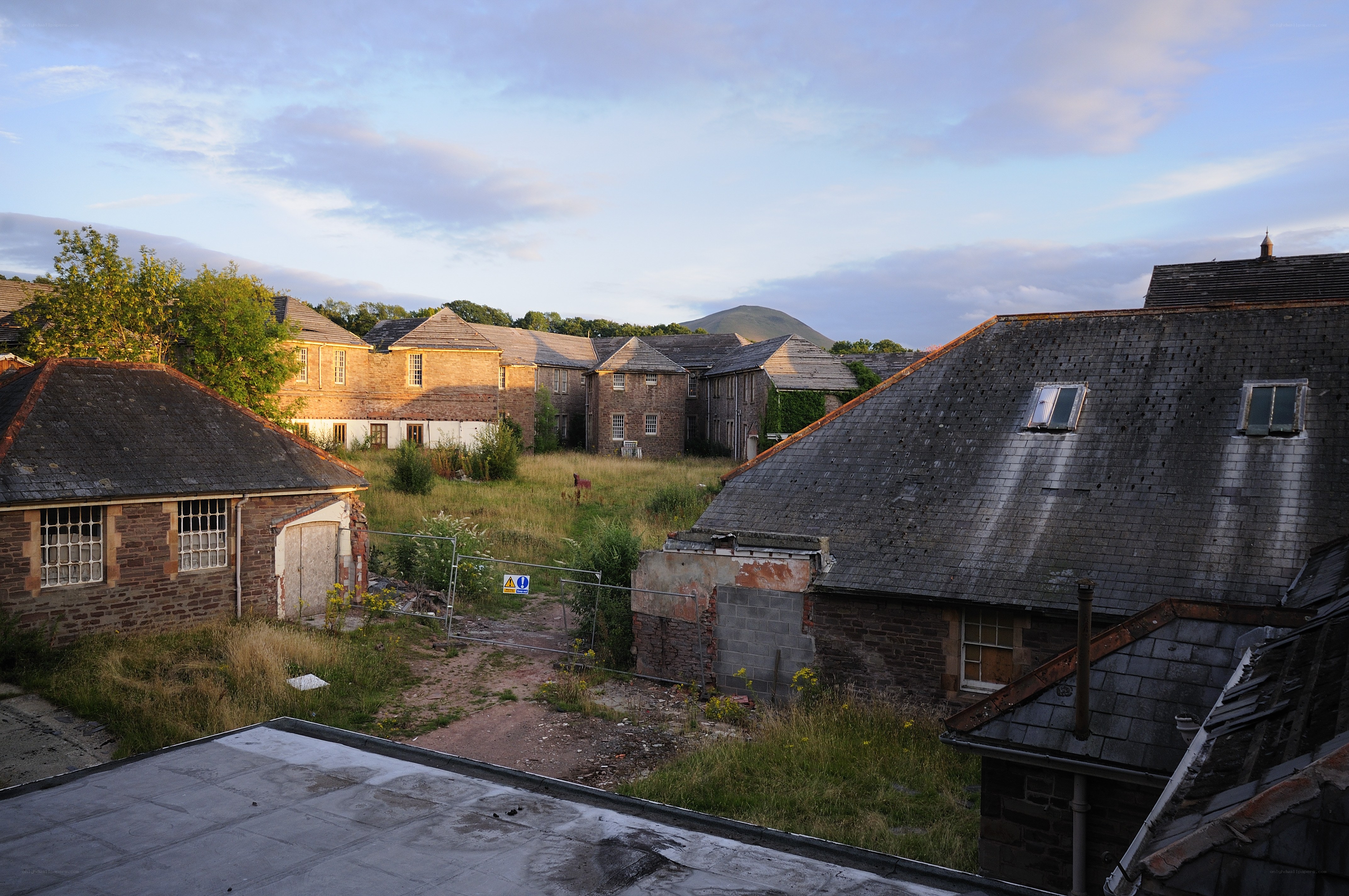 Abandoned buildings at dusk
