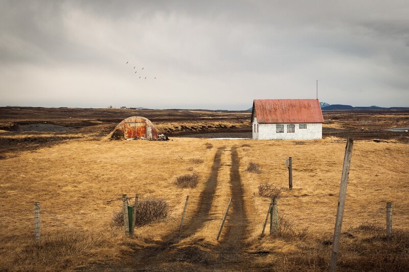 Abandoned Buildings in Field — Brown