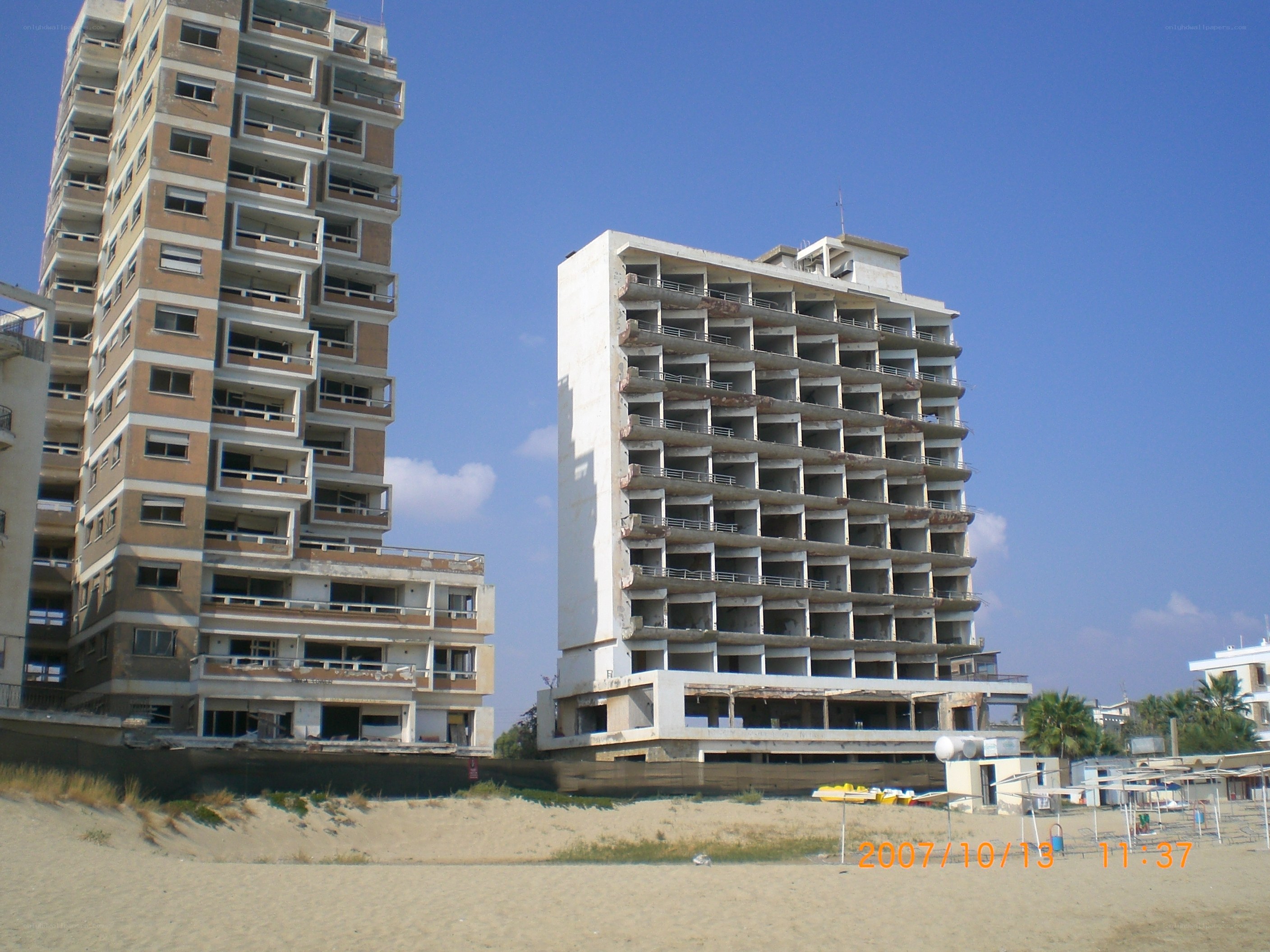 Abandoned buildings on a beach