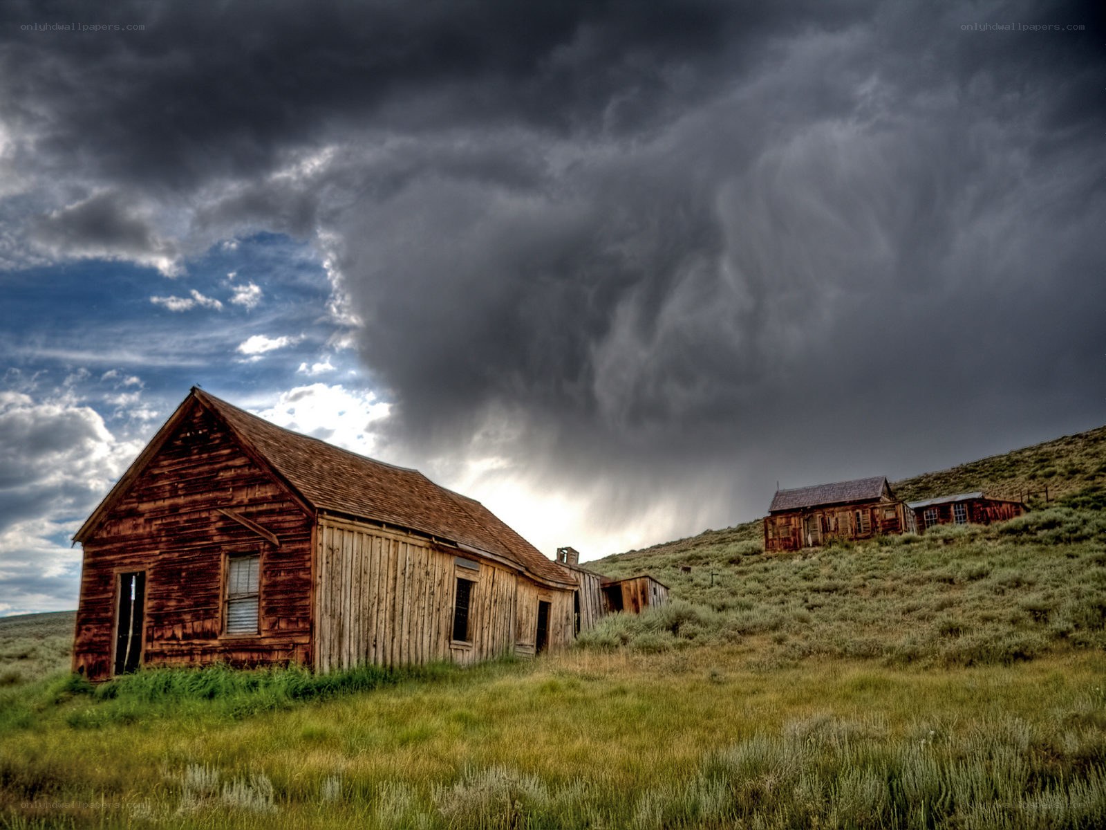 abandoned buildings under stormy sky