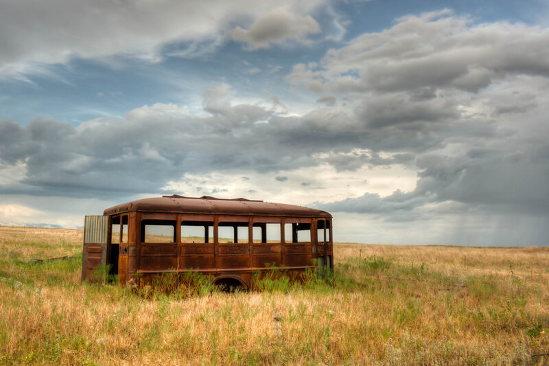 Abandoned Bus in Field