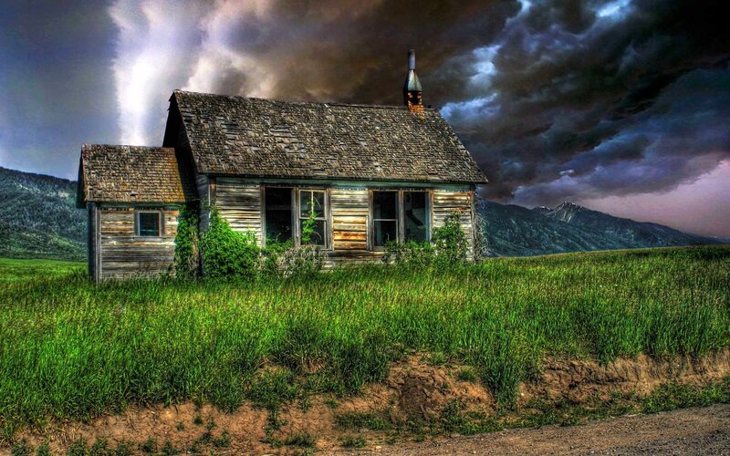 abandoned cabin in a storm